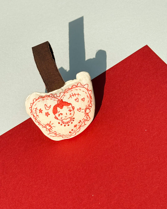 "tiny tale-teller" ornament